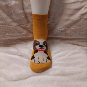 Ensfarget sokk med forskjellige hunderaser